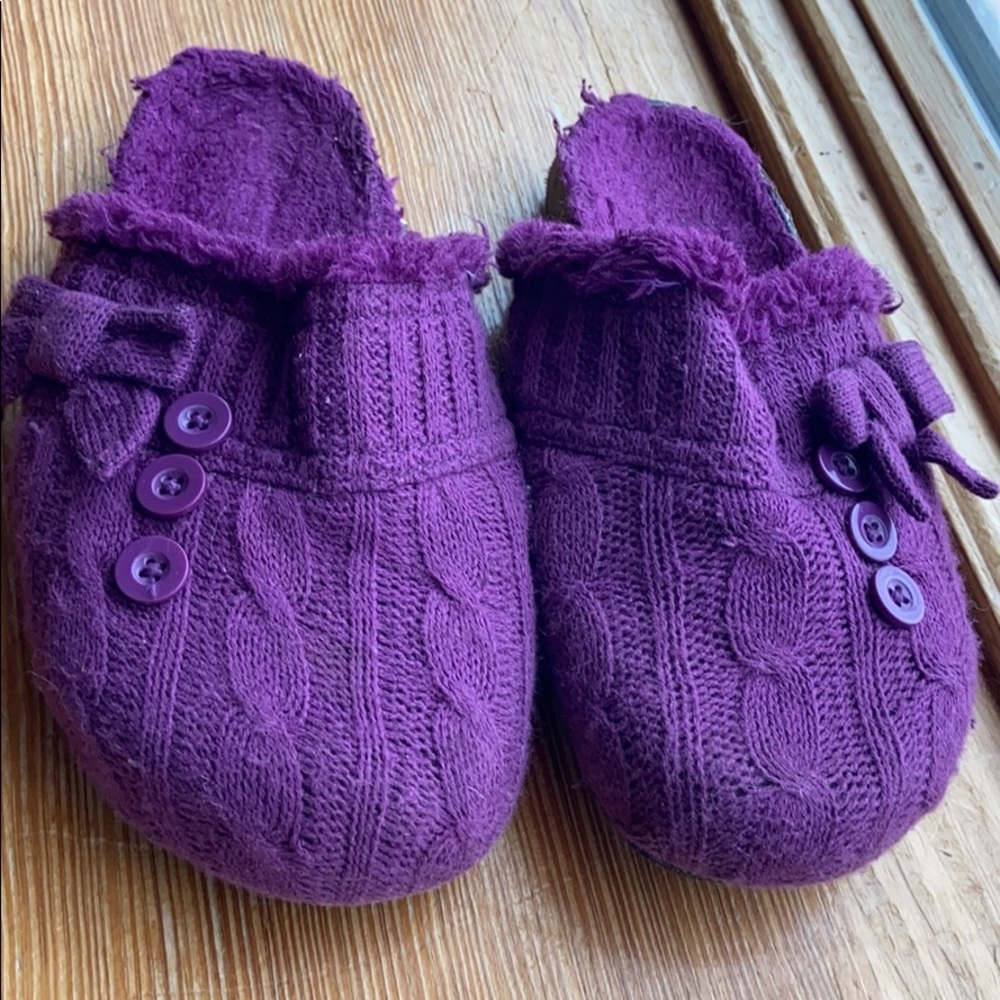 Violet colored slip on shoes